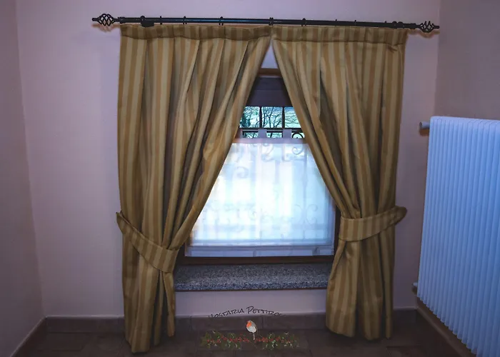 Hostaria Pettirosso Szálloda *